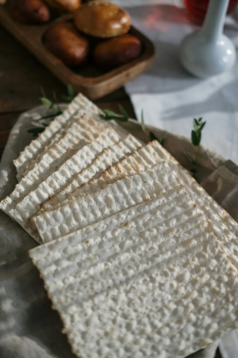 A bunch of crackers are stacked on top of each other on a table.